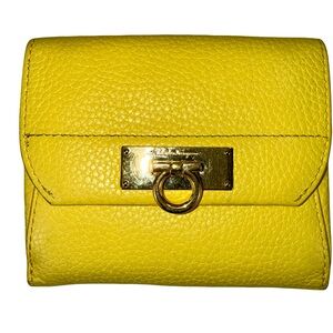 SALVATORE FERRAGAMO SMALL BIFOLD WALLET IN VIBRANT YELLOW